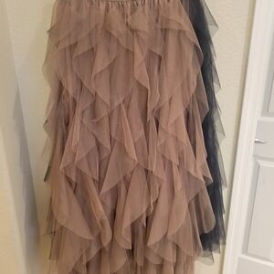 Elegant Nee Skirts. Never worn. Black and Rose Vintage.  A golden belt as a gift